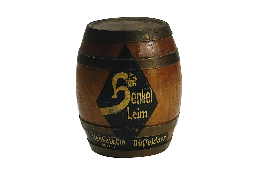 Réplica en miniatura de un tambor impreso de pegamento de Henkel de 1925.